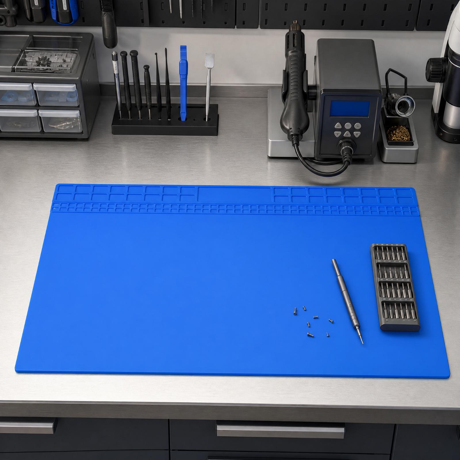 Heat Mat Silicone - 柔軟なシリコン製のはんだ付けマット。スマートフォン修理用の作業台として、熱から保護し、整理整頓された収納スペースを提供します。